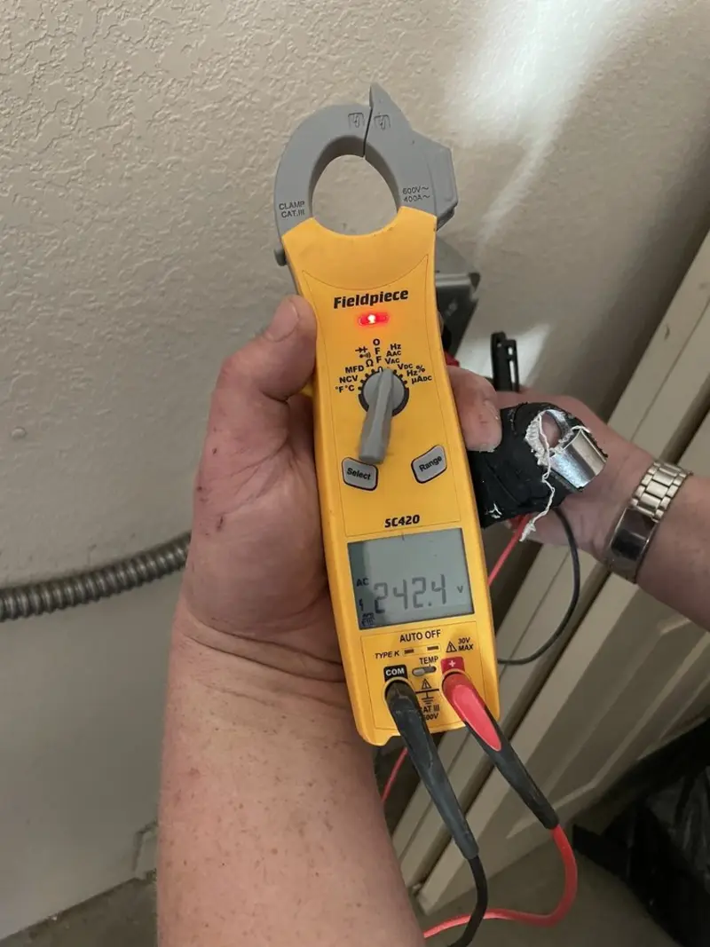 Voltage testing with clamp meter during Generator Installation in Manchester-by-the-Sea